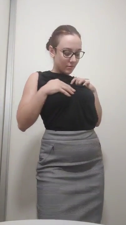Nerdy busty chick flashing her insane boobs at the her job bathroom